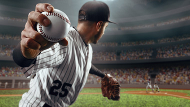 Pitcher about to throw a baseball
