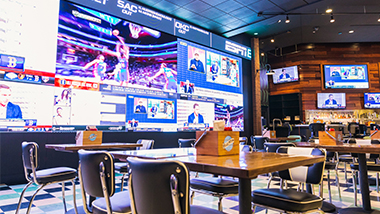 ESPN Bet video wall in restaurant